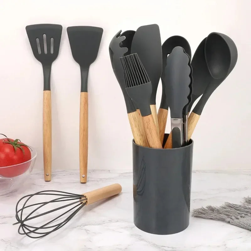 12-Piece Silicone Kitchen Utensils Set 
Non-Stick Cooking Utensils with Wood Handle 
Cooking Tool Set with Storage Bucket 
Complete Heat-Resistant Silicone Utensil Set Kitchen Tools with Storage Holder